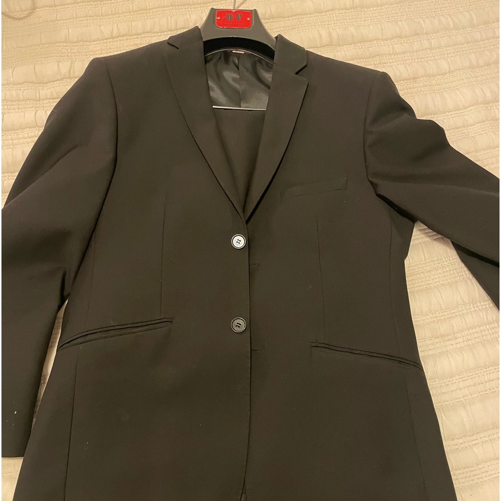 Black suit.